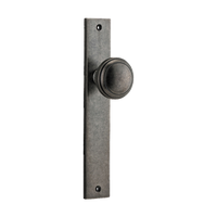 Pair of Iver Paddington knobs on rectangular backplates, showcasing sleek architectural hardware for doors or furniture.
