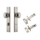 Pair of Iver Paddington knobs on rectangular backplates, showcasing polished architectural hardware for doors.