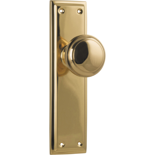 Pair of Tradco Milton knob handles on long backplates, featuring a classic design for cabinet and furniture doors.