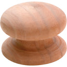 Tradco Timber Cupboard Knob showing a classic wooden handle with a smooth finish on a light wood cabinet door.