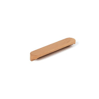 Momo Kimberley timber cabinet pull handle in natural wood finish, featuring a sleek, ergonomic design for kitchen or furniture use.
