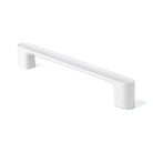 Momo LUV cabinet pull handle in white with sleek modern design, mounted on a cabinet door.