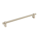 Momo Loreto cabinet pull handle in brass finish with a sleek, modern design on a wooden cabinet.