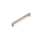 Momo LIBERTY cabinet pull handle in dark bronze finish, sleek and modern with curved design for kitchen or furniture drawers.