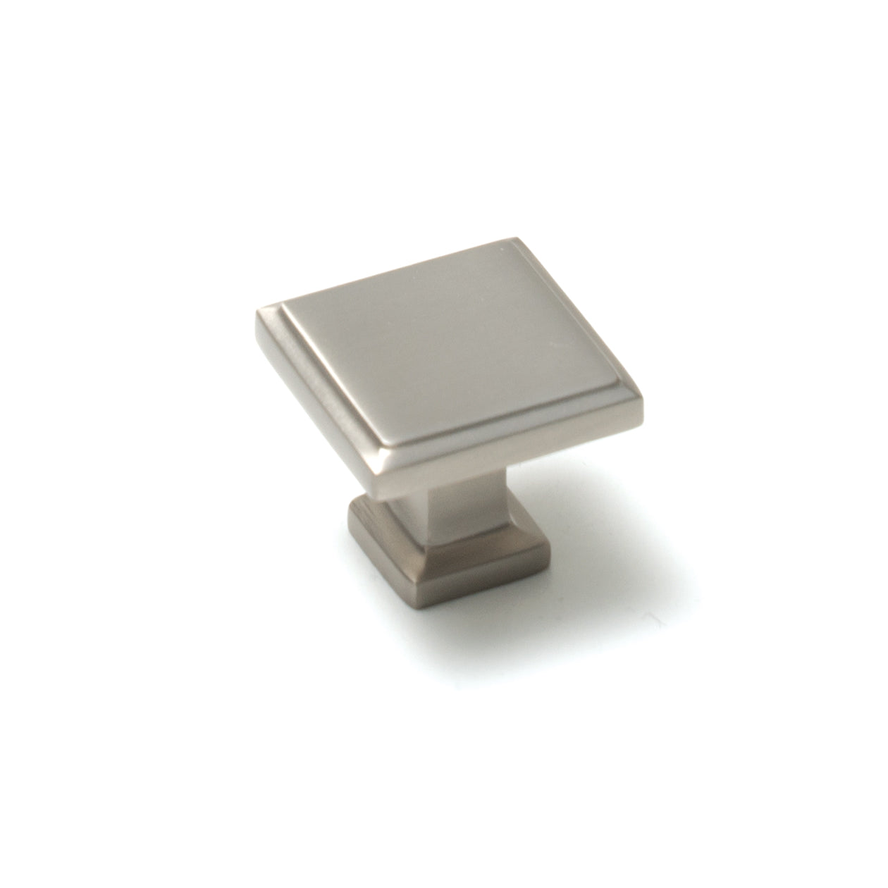 Momo LUCCA square cabinet knob in dark bronze finish with a sleek modern design, mounted on a wooden cabinet.