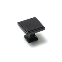 Momo LUCCA square cabinet knob in black finish, featuring a sleek modern design with a smooth square shape and metallic accents.