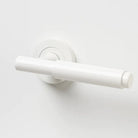 Lo & Co Lola Lever door handle in polished brass, featuring a sleek, modern design and ergonomic shape for easy grip.