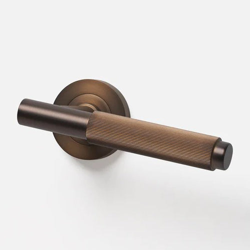 Lo & Co Linear Knurled Lever in brushed bronze finish, showing the textured handle and sleek modern design.