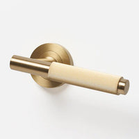 Lo & Co Linear Knurled Lever handle in brushed metal finish, designed for modern interior doors.