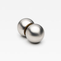Lo & Co Interiors Sphere Passage Set featuring elegant brass door hardware with spherical design elements.