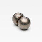 Lo & Co Interiors Sphere Passage Set with decorative metal spheres on a stand, ideal for home decor accents.