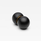 Lo & Co Interiors Sphere Passage Set featuring sleek, modern door hardware with spherical handles and matching passage levers.
