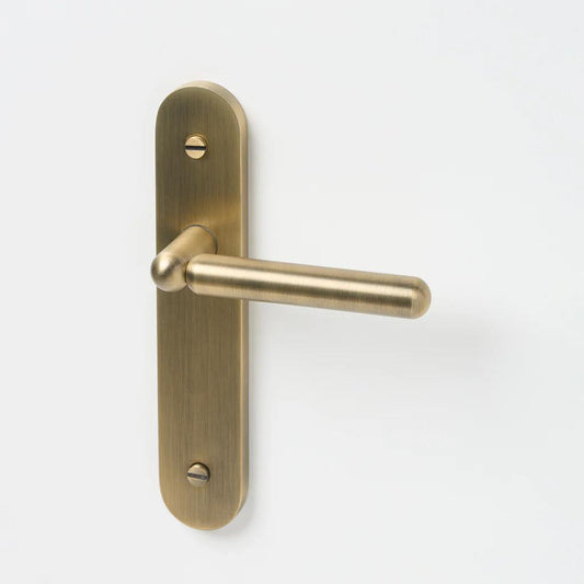 Tubby Lever Aged Brass in Aged Brass