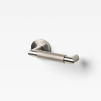 Lo & Co Kintore knurled return lever in brass finish, showing detailed textured grip and sleek design for cabinet or drawer hardware.