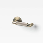 Lo & Co Linear Knurled Return Lever in brushed metal finish, showing its sleek design and textured grip for interior doors.