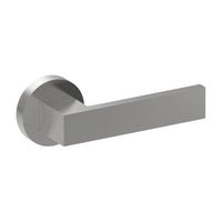 Stainless steel bar door handle from Style Finish Doorware mounted on a door, featuring sleek, modern design.