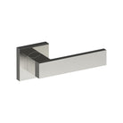 Stainless steel bar door handle from Style Finish Doorware mounted on a door for modern interior design.