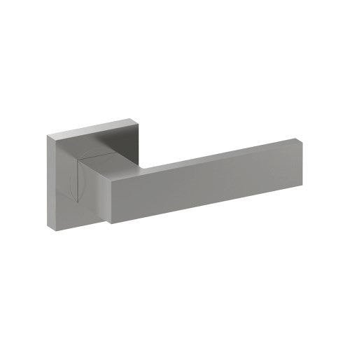 Stainless steel BAR door handle by Style Finish Doorware mounted on a door, showcasing sleek modern design and smooth finish.