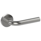 Stainless steel CAPRI door handle by Style Finish Doorware mounted on a door with a sleek, modern design.