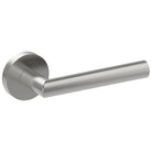 Stainless steel CETINA door handle by Style Finish Doorware, mounted on a door with a sleek, modern design.