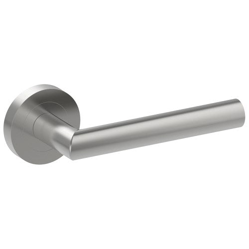 Stainless steel CETINA door handle by Style Finish Doorware, mounted on a door with a sleek, modern design.