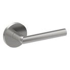Sleek stainless steel CETINA door handle by Style Finish Doorware mounted on a door with a modern design.