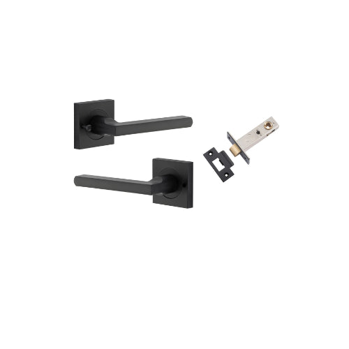 Pair of Iver Baltimore lever door handles on square rose, featuring a sleek, modern design in a polished finish.