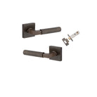 Pair of Iver Brunswick lever door handles on square rose, featuring a sleek, modern design in a durable finish.