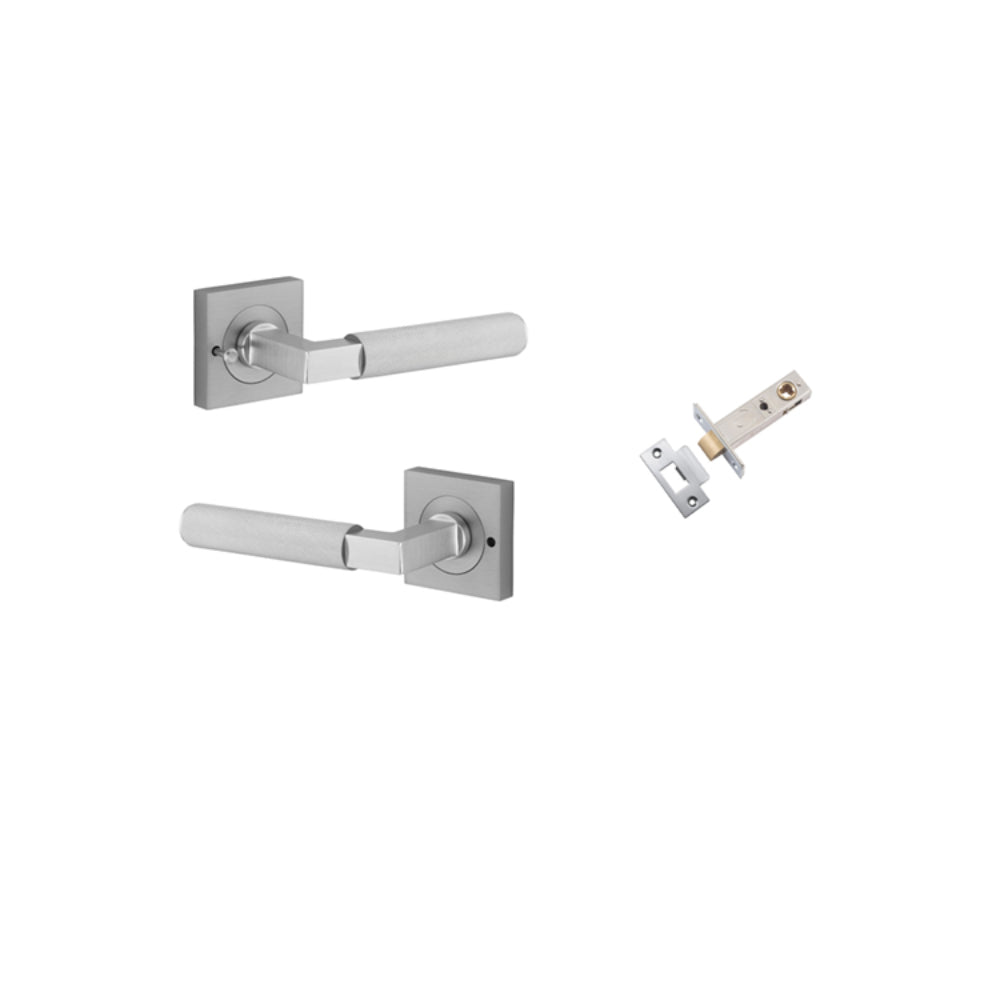 Pair of Iver Brunswick lever door handles on square rose with keyhole, made of polished brass, for interior or exterior use.