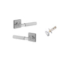 Pair of Iver Brunswick lever door handles on square rose with keyhole, made of polished brass, for interior or exterior use.