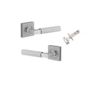 Pair of Iver Brunswick lever door handles on square rose, featuring a sleek, modern design in a polished finish.