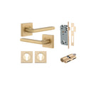 Pair of Iver Baltimore lever handles on square rose, with a sleek, modern design suitable for interior doors.