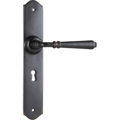 Pair of Tradco Reims lever handles on long backplates, featuring a sleek, modern design for interior doors.