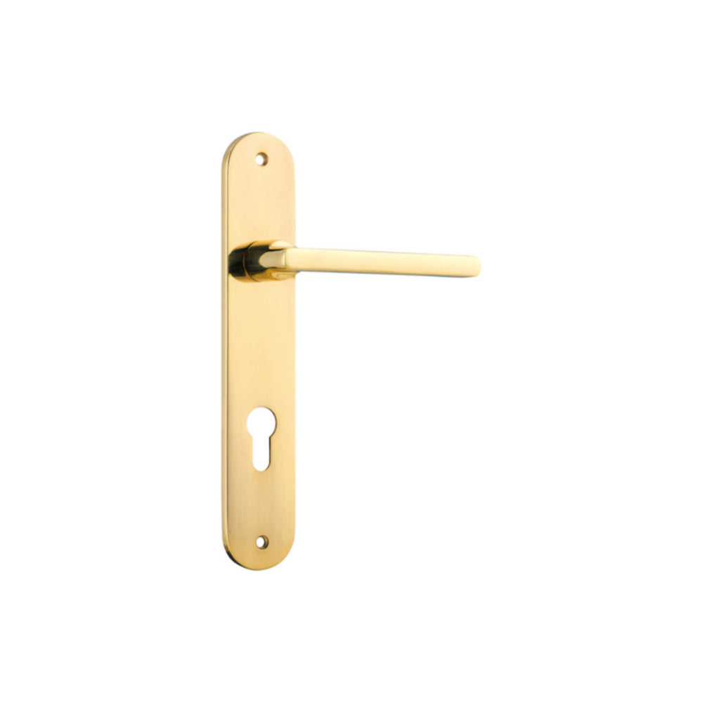 Pair of Iver Baltimore lever door handles with oval backplates, featuring a sleek, modern design in a polished finish.