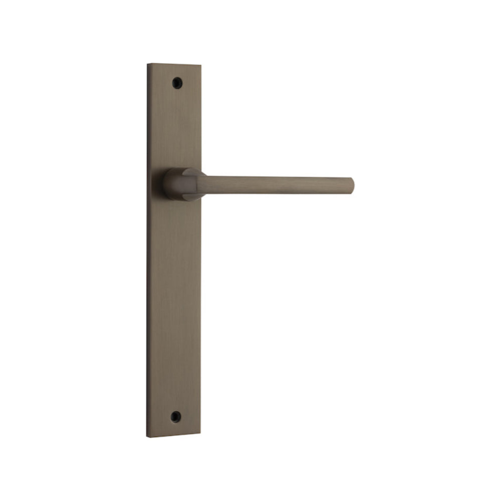 Pair of Iver Baltimore lever door handles on rectangular backplates, featuring a modern black finish and sleek design.