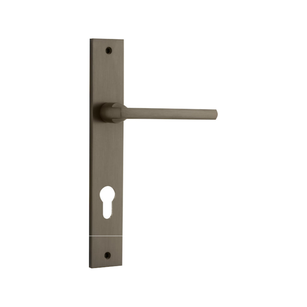 Pair of Iver Baltimore lever door handles on rectangular backplates, featuring sleek metal finish and modern design.