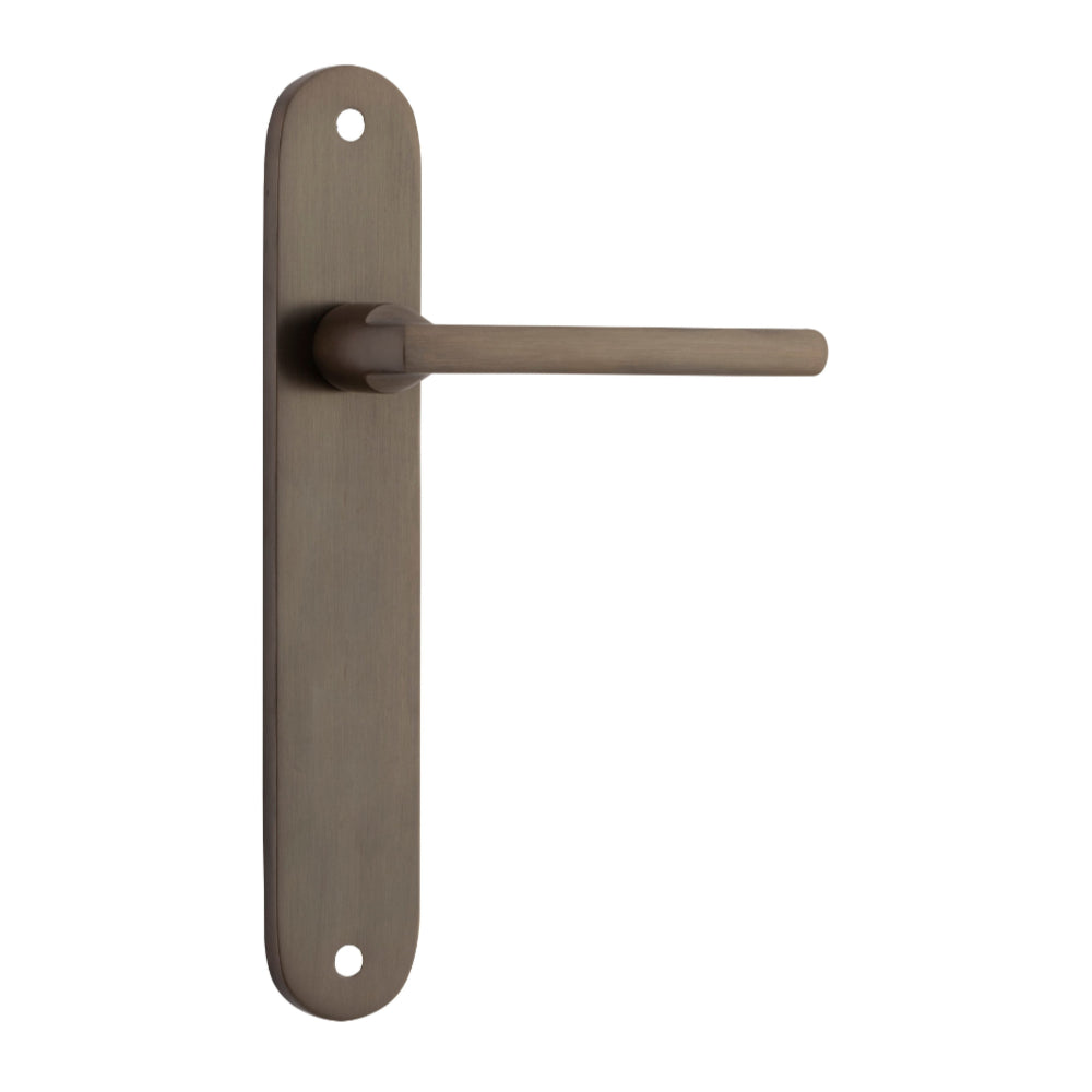 Pair of Iver Baltimore lever door handles on oval backplates, featuring a sleek lever design and polished finish.