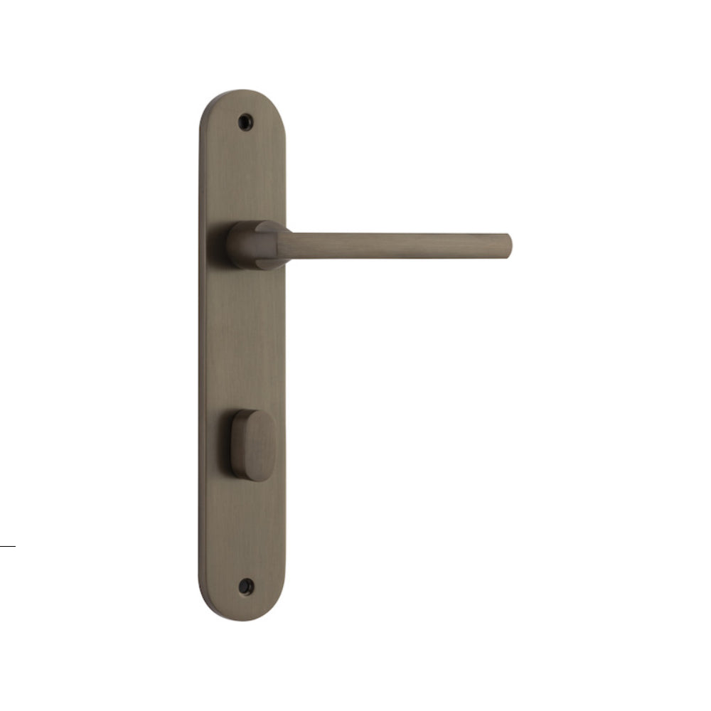Pair of Iver Baltimore lever door handles on oval backplates, featuring a sleek, modern design for interior or exterior doors.