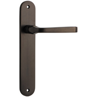 Pair of Iver Annecy lever handles with oval backplates, featuring polished chrome finish and elegant, modern design.