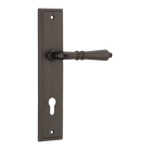 Pair of Iver Sarlat lever handles on stepped backplates, showcasing elegant design and polished finish for interior doors.