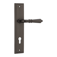 Pair of Iver Sarlat lever handles on stepped backplates, showcasing elegant design and polished finish for interior doors.