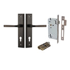 Pair of Iver Annecy lever door handles with stepped backplate in a polished finish, shown on a door.