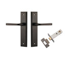 Pair of Iver Annecy lever handles on stepped backplates, showcasing elegant brass finish and modern design for doors.