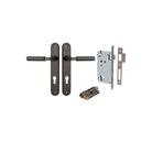 Pair of Iver Berlin lever handles on oval backplates, featuring sleek black finish and modern design for interior doors.