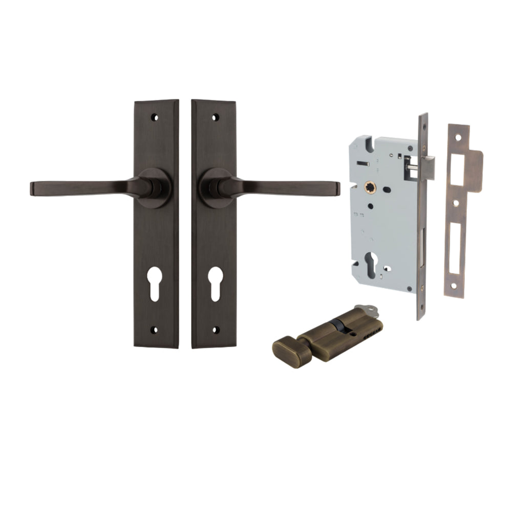 Pair of Iver Annecy lever door handles on chamfered backplates, showcasing elegant black finish and modern design.