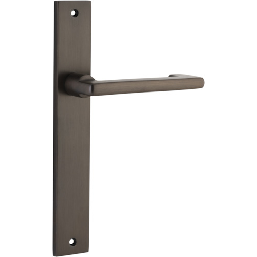 Pair of Iver Baltimore return lever door handles on rectangular backplates, showing polished metal finish and ergonomic design.