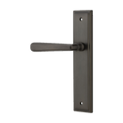 Pair of Iver Copenhagen lever door handles on stepped backplate, showcasing sleek, modern architectural hardware design.