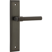 Pair of Iver Helsinki lever door handles on stepped backplates, featuring sleek modern design in polished finish.