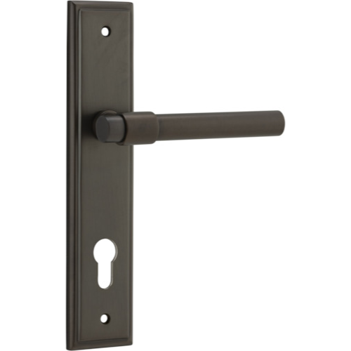 Pair of Iver Helsinki lever door handles on stepped backplates, featuring modern brushed metal finish and sleek design.
