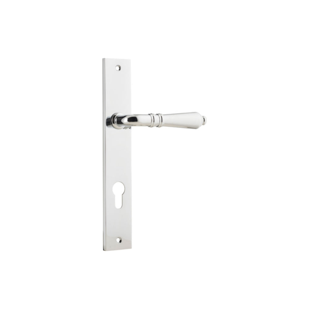 Pair of Iver Sarlat lever handles with rectangular backplates, showcasing elegant brass finish and modern design.